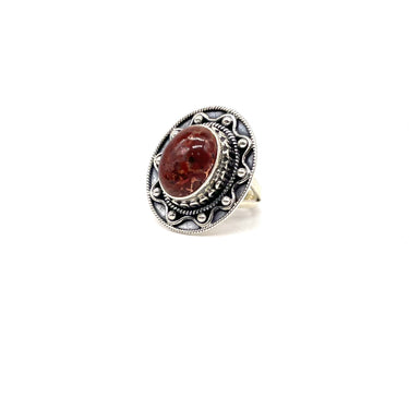 Ornate Pebble Trimmed Sunstone Ring