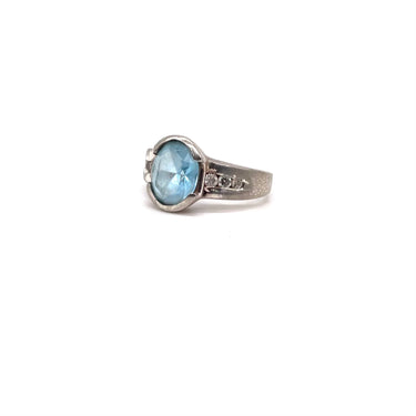 Aquamarine Set C Z Trimmed Ring
